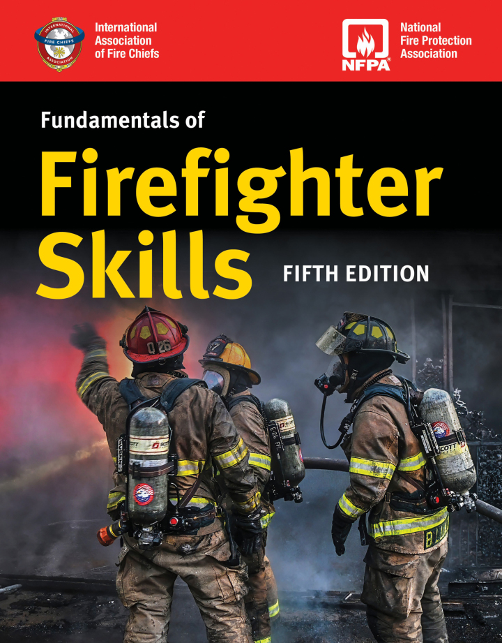 Cover of "Fundamentals of Firefighter Skills, Fifth Edition," showing three firefighters in full gear using hoses to put out a fire, with smoke and flames in the background.